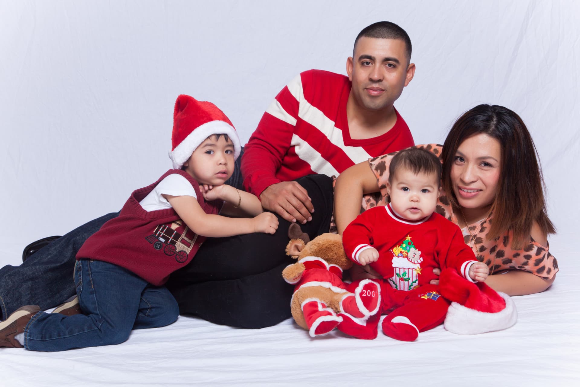 Family gathered together for a festive holiday studio portrait